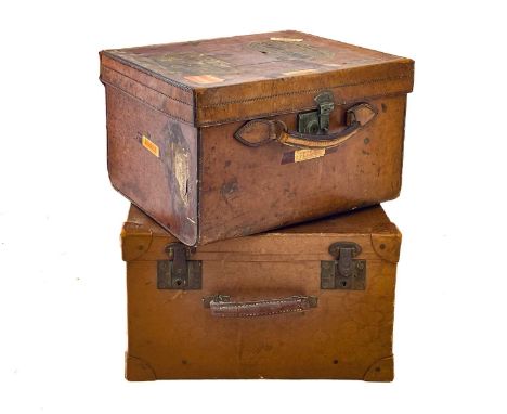 An early 20th century gentleman's leather hat box.  27cm x 43.5cm x 35.5cm (excluding handle), together with another small tr