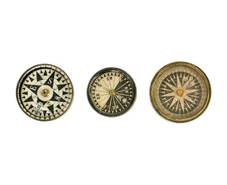 A Singers Patent brass compass. Diameter 4cm together with two other brass compasses. (3)