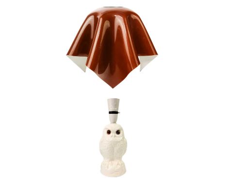 A Poole pottery owl table lamp with glass eyes. Height 26cm together with a folded perspex light shade circa 1970. 