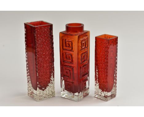 A Whitefriars Greek Key vase, designed by Geoffrey Baxter, textured effect in ruby, shape number 9810, 20cm; a Nailhead squar