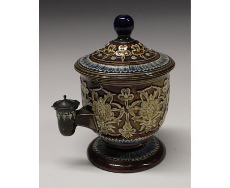 A Doulton Lambeth stoneware Isobath inkwell, manufactured for Thomas de Rue &amp; Co, applied with stylised flowers and leafy