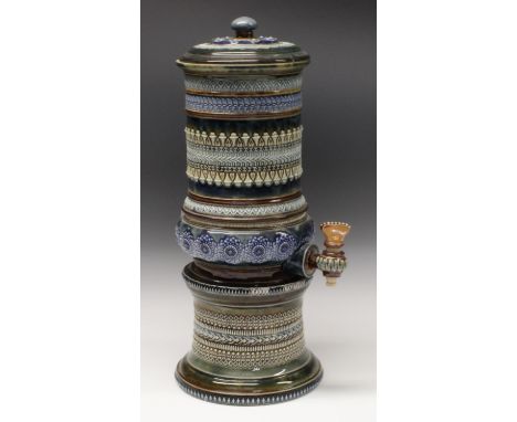 A Doulton Lambeth water filter, incised and applied with stylised leaves,  the bulbous base with floral roundels,  glazed in 