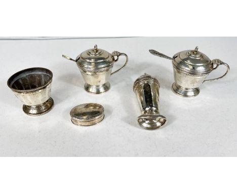 A 4 piece hallmarked silver cruet set (pepper a.f.) Birmingham 1941; a small oval hallmarked silver patch box. 