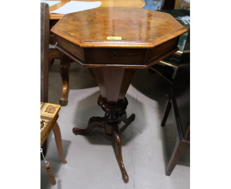 A 19th century burr walnut sewing table with octagonal top, tripod base 