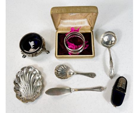 A collection of hall marked silver items, shell caddy spoon, salt, dish etc 