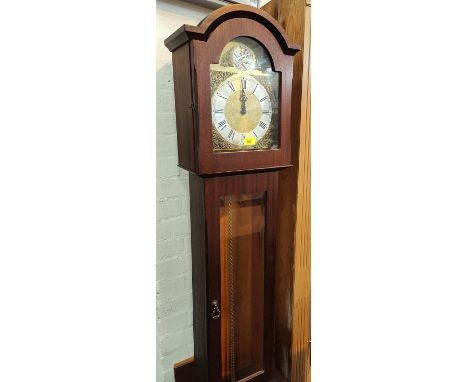 A reproduction mahogany longcase clock with weight driven chiming movement 