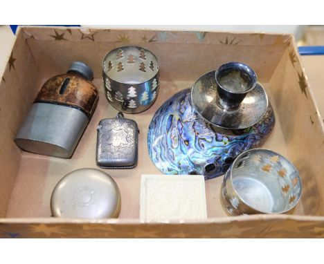 A hallmarked silver vesta case with scrawling decoration and a military collapsible tot cup in pocket of a laptop type case; 