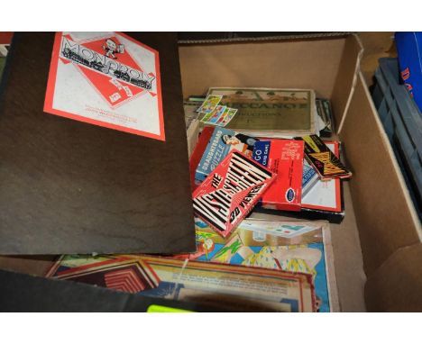 A selection of vintage board games including Monopoly, playing cards etc 