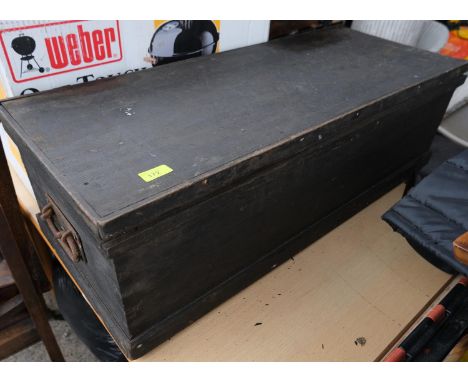 A stained wooden tool box and a brass and blue glass three branch ceiling light 