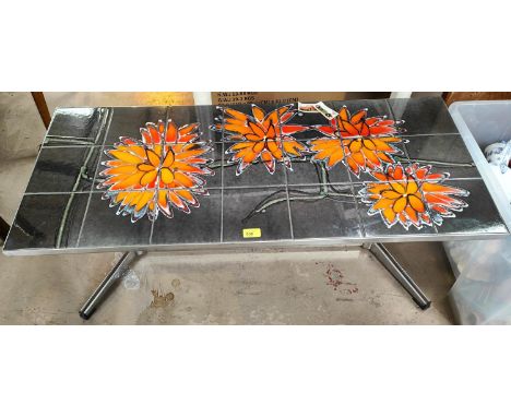 An ADRI 1970's tile top chrome coffee table with trestle base, abstract floral design, 108 x 46 x 41cm high 1 tile in corner 