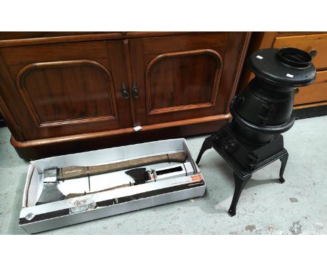 A cast iron burner and a Magnusson unused Axe wood cutting set 