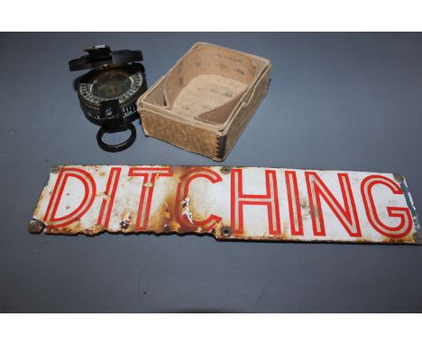 A WWII 1941 Home Guard Military compass and an enamel sign DITCHING - 6cm X 26cm - rust to sign, compass sticking