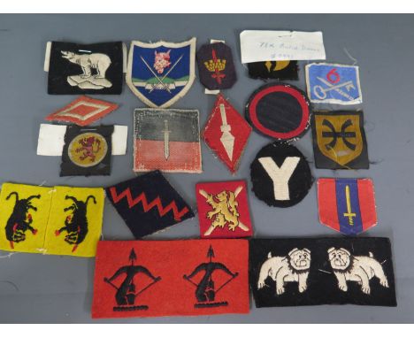Three pairs and twelve single British Divisional cloth insignia from the Army Museum, Halifax Citadel, NS, Canada
Condition R