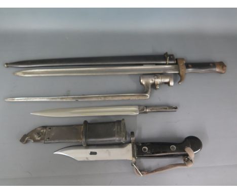 A French model 1892 Berthier first pattern Bayonet and scabbard, a socket bayonet - Length 37cm, an East German model 1959 AK