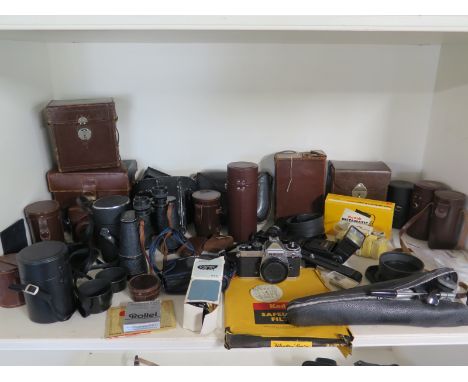 Various Photographic items with leather camera cases, including a Robot case and a Nikon FE2 camera
