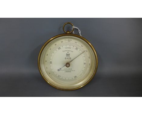 A brass Air Ministry Compensated aneroid barometer by J Hicks, Hatton Garden, London - no 6408 -Met Office pattern post 1920 