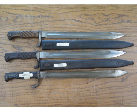 A German model S98/05 n.A.S. Abg pattern Butcher Bayonet without scabbard, two German model S98/05 n A pattern Butchers Bayon