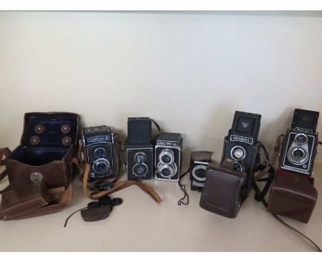 Five 120 twin lens reflex cameras - Halina A1, Rollop, Seagull, Yashica A and a Rolliflex type camera