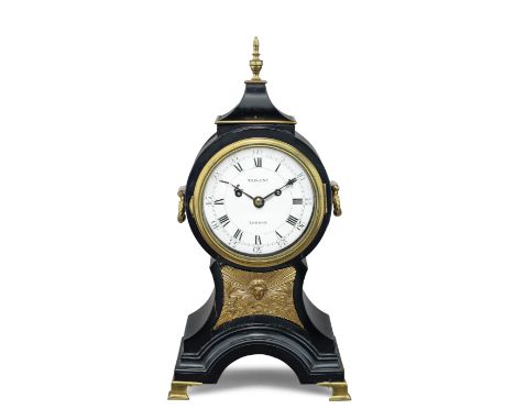 A rare early 19th century brass-mounted ebonised balloon shaped table clock of small sizeTregent, London. The frontplate furt