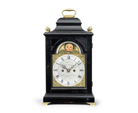 A late 18th century ebonised table clock with painted moonphaseSamuel Cochran, LondonThe case with bell top supporting a bras