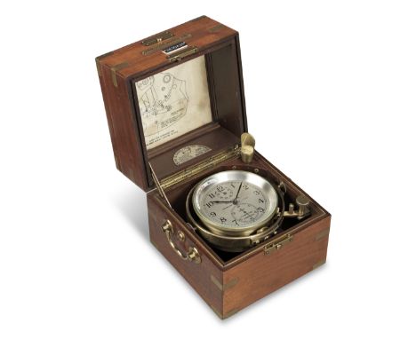 A 20th century American brass-bound mahogany two-day marine chronometer with log bookHamilton 21, No.2EIO421. Further signed 