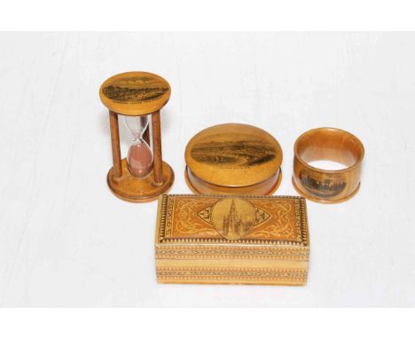 Four pieces of Mauchline ware including Redcar egg timer.