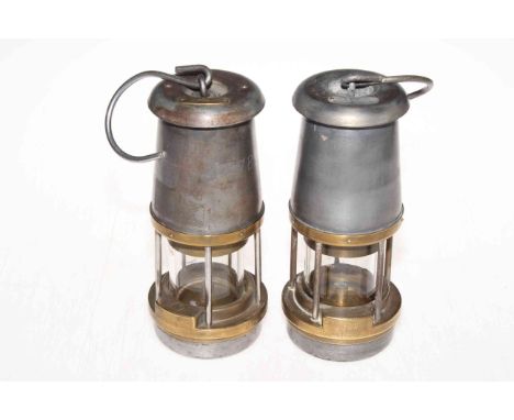 Two Wolf Safety Lamp miners lamps.
