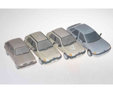 Four Lladro FORD model cars.