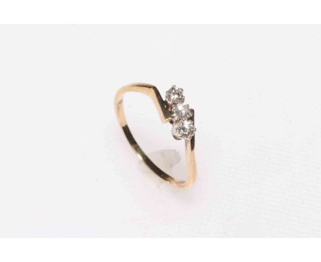 Diamond three stone 9 carat gold ring, size R.