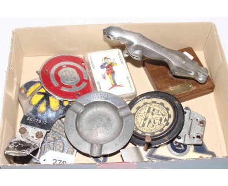 Box of six vintage car badges, jaguar mascot, ashtray and playing cards.