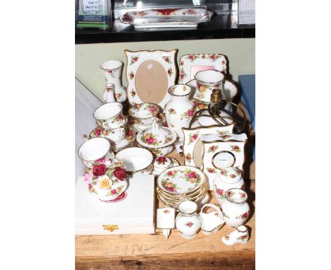 Collection of Royal Albert Old Country Roses including lamp, cased spoons, photograph frames, clock, etc, approximately forty