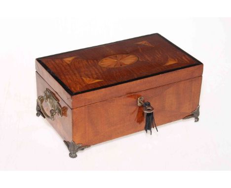 Inlaid mahogany trinket box on brass paw feet and containing collection of vintage keys, 24cm across.