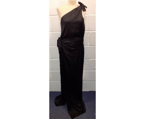 Gucci-A ladies black silk off the shoulder and full length evening gown, European size 40 having bow detail to shoulder and l