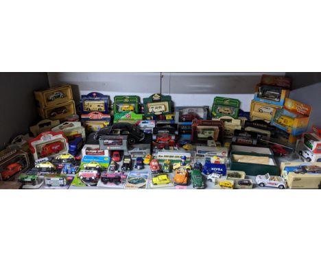 A collection of boxed, packaged and unboxed diecast model cars, to include Lledo Custom and Classic collection Models of Yest