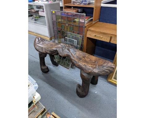 A 20th century carved hardwood two seat bench, fashioned as two fish on shaped legs, 63cm h x 138cm l, Location: 