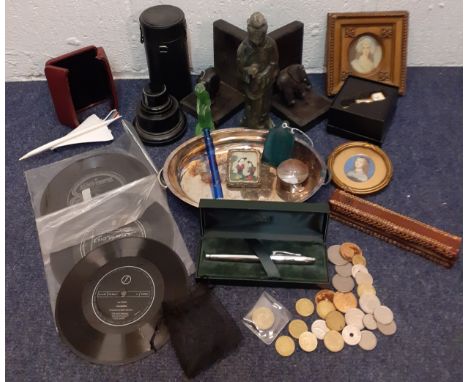 A miscellaneous lot of small collectables to include a pair of carved bookends A/F framed miniatures, worldwide coins, a Cros