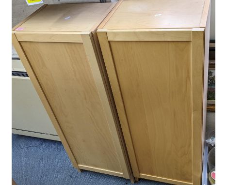 A collection of light wood modern furniture to include four single door cabinets and a pair of open bookcases, Location: 