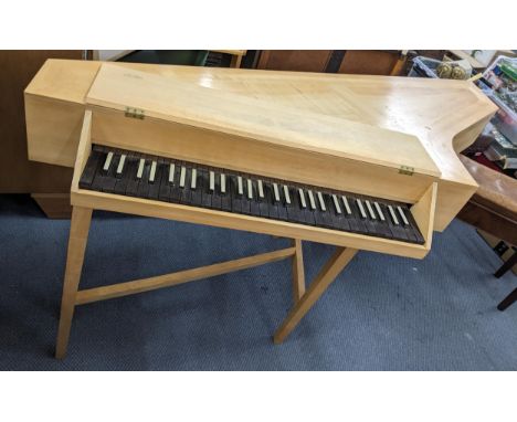 A modern part built harpsichord in a light wood frame, 83cm x 174cmLocation: 