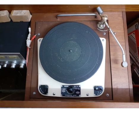 A Garrard 301 Transcription turntable no:51400/2 in a teak cabinet 25" high x 20" deep x 54" wide, enclosing a later Binatone