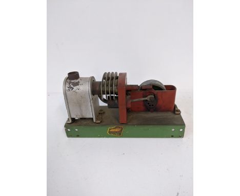 A Passall stationary horizontal hot air engine, circa 1940, made by Freeman and brown, 19cml x 11cmh, Location: 