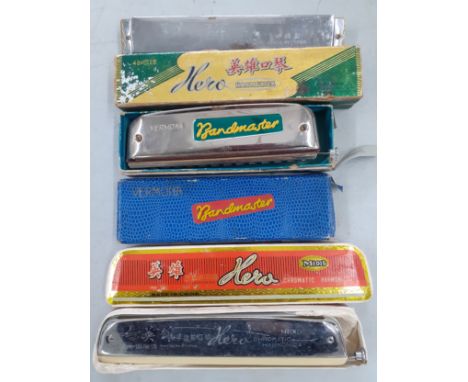 Three vintage harmonicas to include a Vermona Bandmaster and a Hero chromatic harmonica, all in original boxes. Location:RWM 