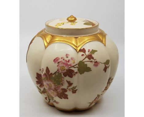 A late 19th century Royal Worcester blush ivory melon shape rose jar and cover, shape 1313, hand painted with garden flowers 