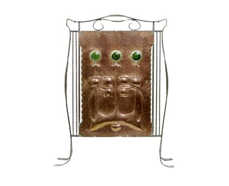 An Arts and Crafts copper and wrought iron firescreen,  the rectangular copper panel stamped in low relief with stylised flow