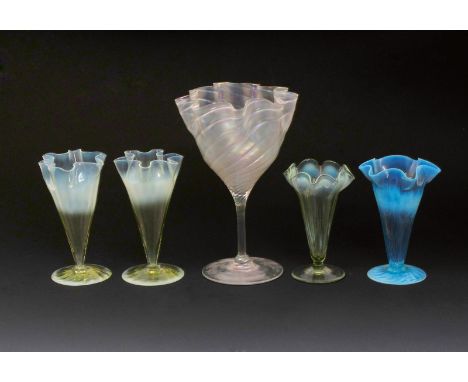 A James Powell & Sons Whitefriars blue opal vase,  flaring form with pinched rim, on flaring foot, two straw opal vases simil