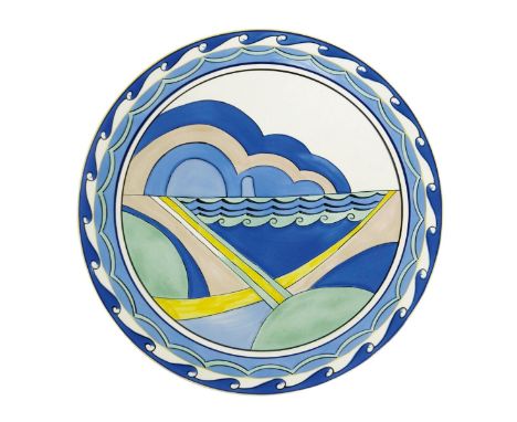 A modern limited edition Poole Pottery Studio charger by Sue Pottinger,  painted with a seascape in colours on a cream ground