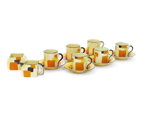 An Art Deco Edna Best Art Pottery part coffee set retailed by Lawleys,  painted with geometric Cubist panels  in orange on a 