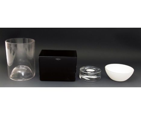 An Orrefors Puck  glass candlestick designed by Lena Bergstrom,  thick clear glass, in original box, four  iittala votive gla