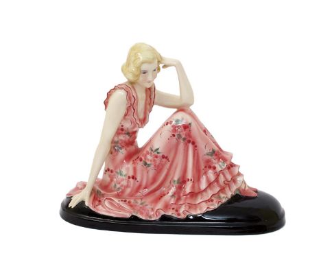 Lilian a Goldscheider Pottery figure designed by Stephan Dakon, model no.6554, modelled seated resting her elbow on her raise