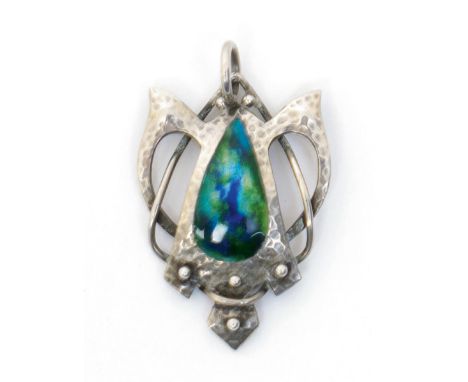An Art Nouveau Gourdel Vales & Co silver and enamel pendant, the sinuous wirework form with hammered finish, enamelled blue a