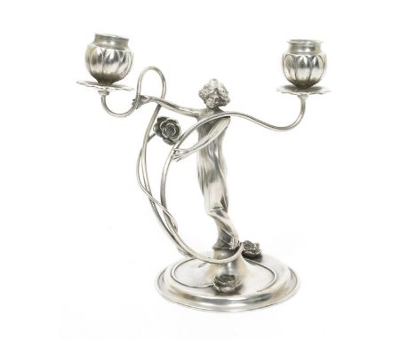 A Victor Silver Company electroplated figural candlestick,  model no. 02538, modelled as an Art Nouveau maiden holding flower